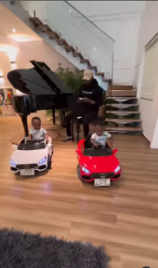 “Big Aunty duties” - Comedian, Taaoma gifts Kizz Daniel’s twin babies, brand new cars (Video)