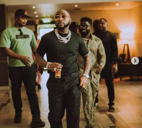 Heartwarming moment man proposed to girlfriend in the presence of Davido at a nightclub (Video)