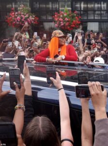 Nicki Minaj, got her fans love. Her arrival sparked chaos in Camden on Monday as fans mobbed the street for a glimpse of the singer. 
