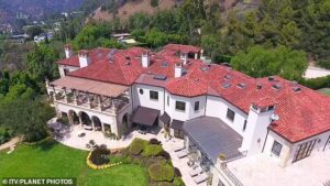 An intruder was arrested at Grammy Award-winning singer/rapper Drake's $75M Beverly Hills mansion for misdemeanor offence on Friday.   The singer's staff had noticed the intruder near the pool house