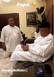 "Kneeling Nah Water" - Nigerians React As Picture Of Cubana Chiefpriest Kneeling Before Vice President Shettima Goes Viral